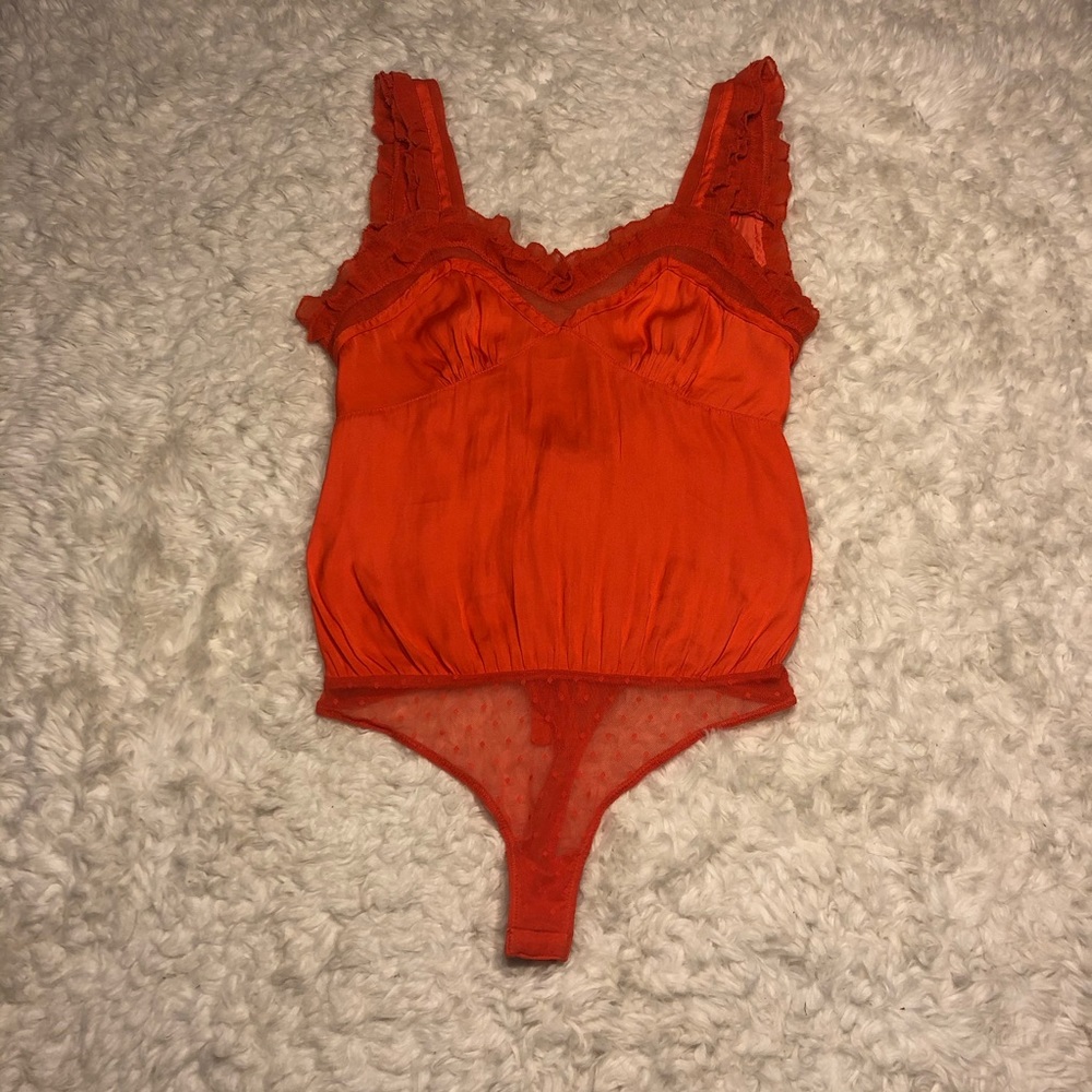 NWOT Free People Ooh Ahh Bodysuit in Orange